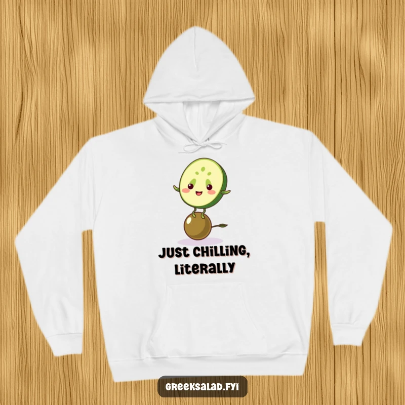 Funny hoodie with a cheerful cucumber balancing on an olive, offering warm, humorous comfort and healthy food vibes.